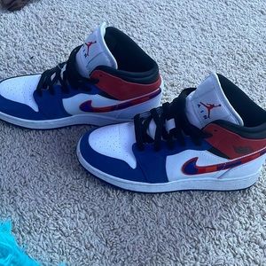 Red white and blue Jordan 1 mid